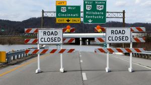 Road closure signs due to submerged roadways in Ohio