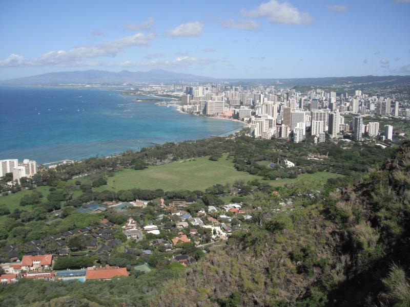 Park and high-rise buildings along coast.